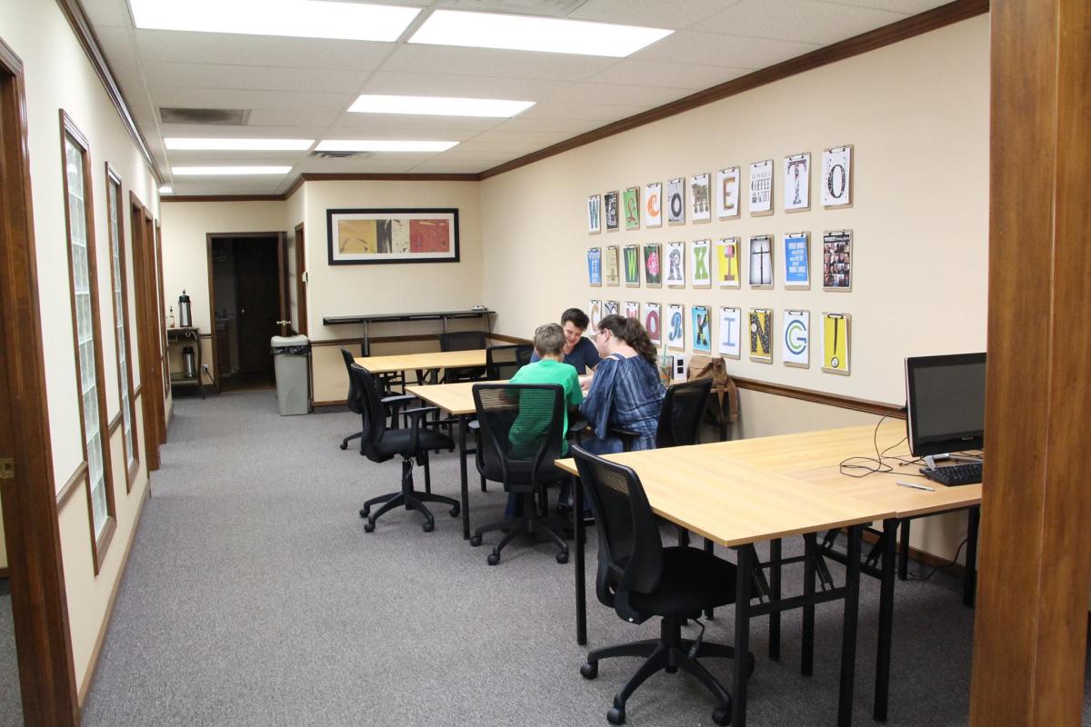 Shared work tables inside WorkIT Coworking Center in Stillwater
