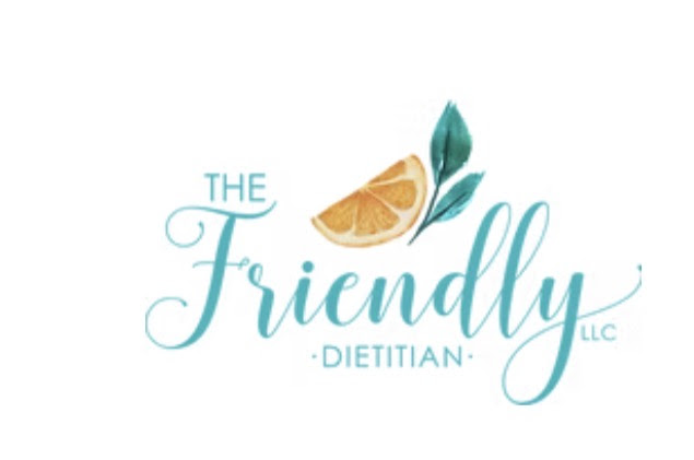 Logo for The Friendly Dietitian LLC with teal script font, an orange slice, and green leaves above the word Friendly on a white background—perfect for your next business spotlight or feature in Bearded Rat Mysteries. -WorkIT Coworking Center